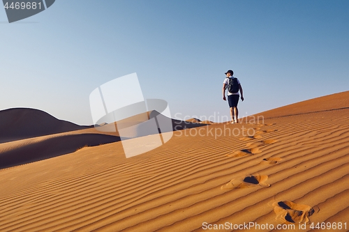 Image of Tourist in desert