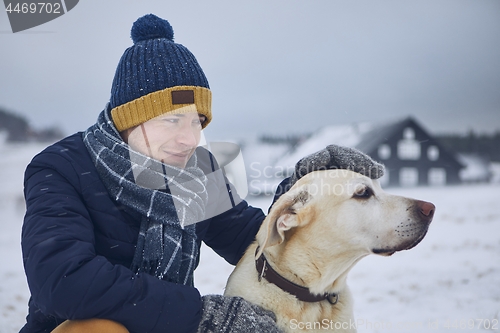 Image of Friendship between pet owner and his dog