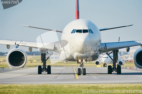 Image of Sunny day at busy airport