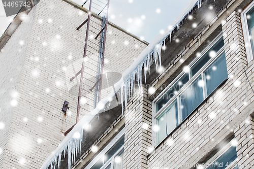 Image of icicles on building or living house facade