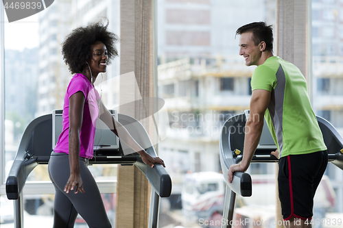 Image of people exercisinng a cardio on treadmill