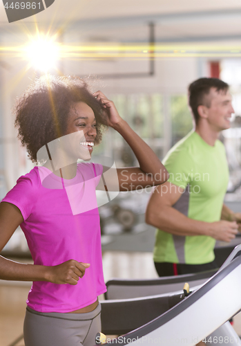 Image of people exercisinng a cardio on treadmill