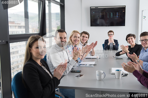 Image of Group of young people meeting in startup office