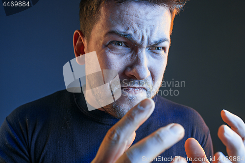 Image of Sports, emotions and fan people concept - sad man watching sports on tv and supporting team at home