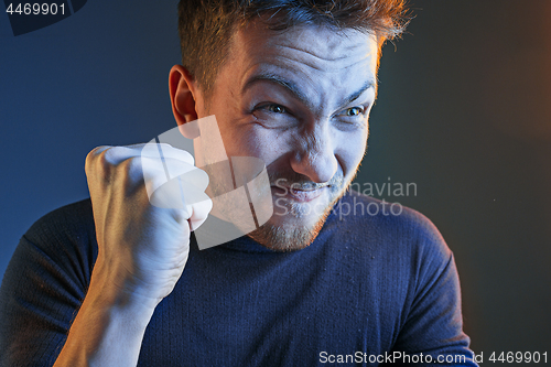 Image of Sports, emotions and fan people concept - sad man watching sports on tv and supporting team at home