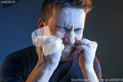 Image of Sports, emotions and fan people concept - sad man watching sports on tv and supporting team at home