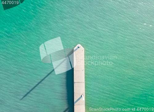 Image of Aerial top down of little boat jetty