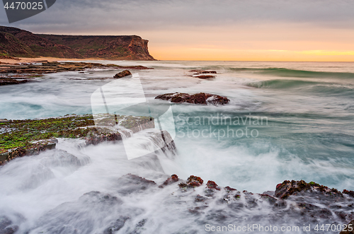 Image of Waves and waterfalls coastal seascape