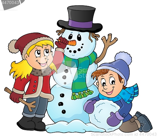 Image of Kids building snowman theme image 1