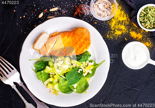 Image of chicken breast with salad