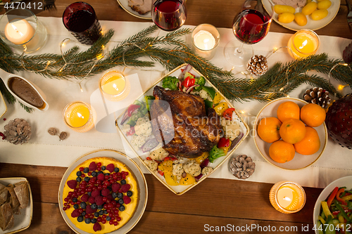 Image of roast chicken or turkey on christmas table