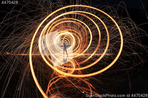 Image of Night Time Light Painted Imagery With Color and Steel Wool Spinn