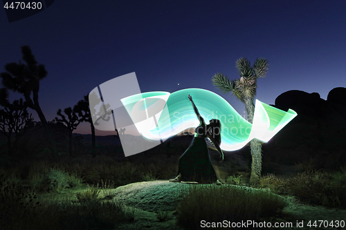 Image of Girl Light Painted Under the Milky Way