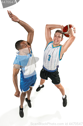 Image of Full length portrait of a basketball players with ball