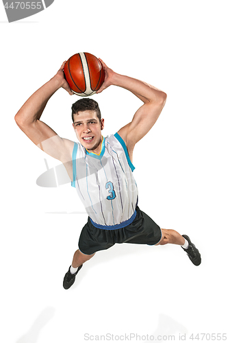 Image of Full length portrait of a basketball player with ball