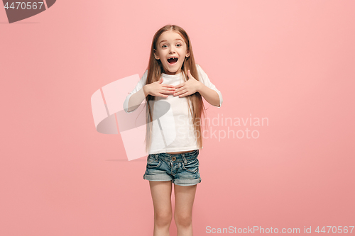 Image of Happy success teen girl celebrating being a winner. Dynamic energetic image of female model