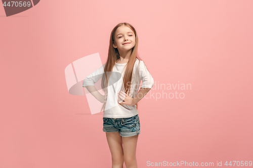 Image of Happy success teen girl celebrating being a winner. Dynamic energetic image of female model