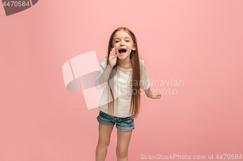 Image of Isolated on pink young casual teen girl shouting at studio