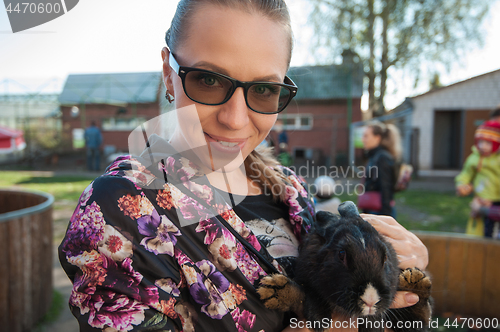 Image of Young woman with rabbit