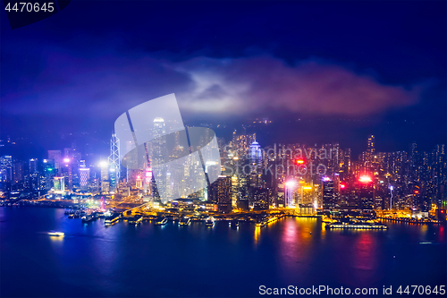 Image of Aerial view of illuminated Hong Kong skyline. Hong Kong, China