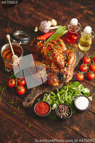 Image of Roasted whole chicken or turkey served with chilli pepers and chive