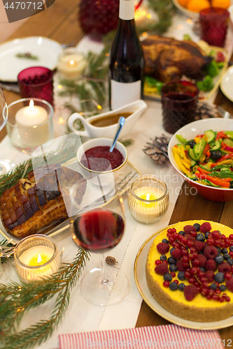 Image of food and drinks on christmas table at home