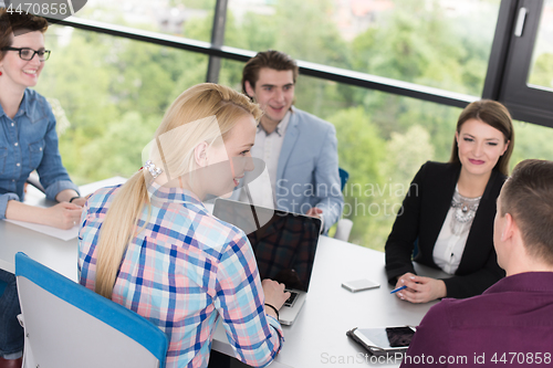 Image of Business Team At A Meeting at modern office building