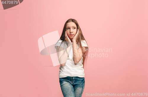 Image of Young serious thoughtful teen girl. Doubt concept.