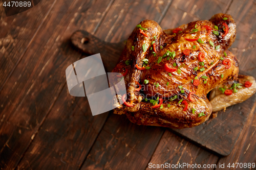 Image of Homemade roasted spicy chicken with chilli and chive