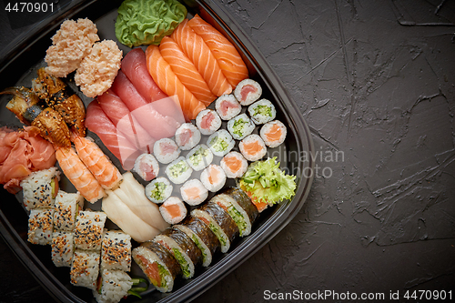 Image of Various kinds of sushi on plate or platter set