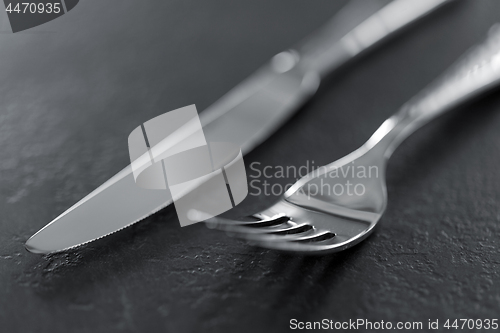 Image of close up of fork and knife on table