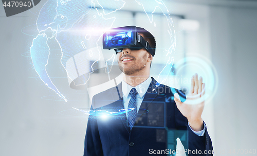 Image of businessman with virtual reality headset at office