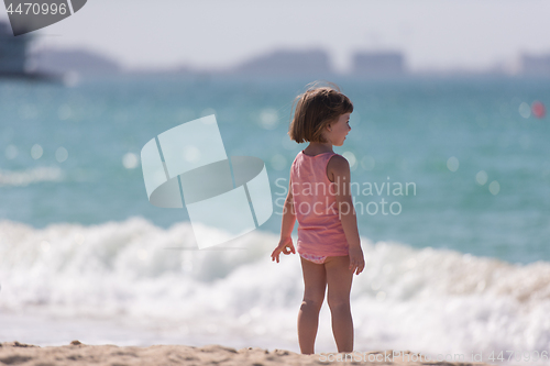 Image of little cute girl at beach