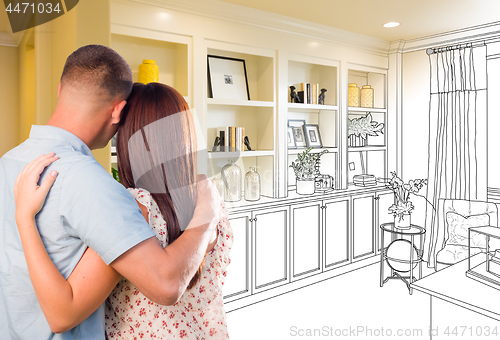 Image of Young Military Couple Facing Custom Built-in Shelves and Cabinet