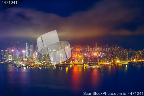 Image of Aerial view of illuminated Hong Kong skyline. Hong Kong, China