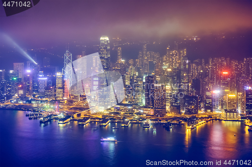 Image of Aerial view of illuminated Hong Kong skyline. Hong Kong, China