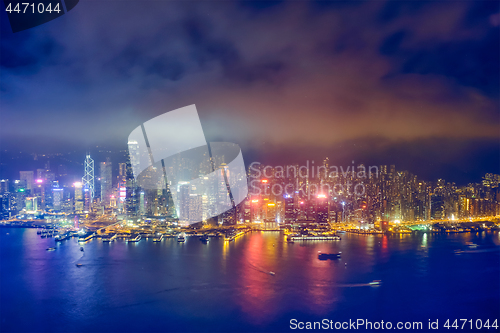 Image of Aerial view of illuminated Hong Kong skyline. Hong Kong, China