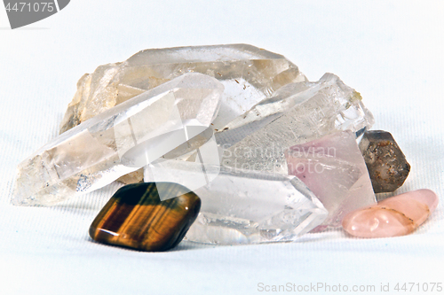 Image of surface level quartz and cats eye on white