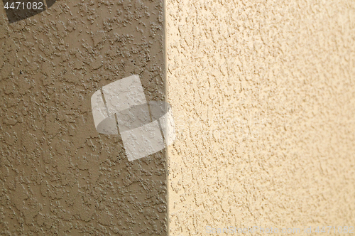 Image of beige stucco building corner background texture