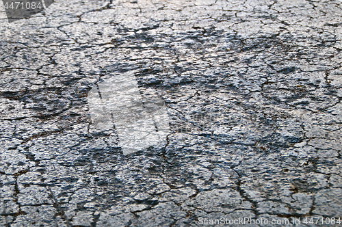 Image of dried cracked asphalt roadway texture