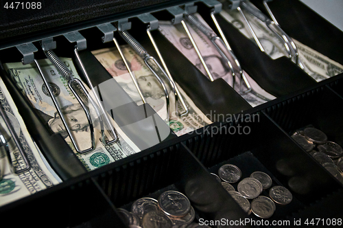 Image of US Money in open cash drawer