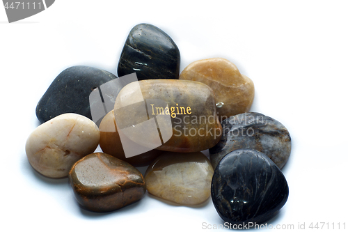 Image of polished stones with imagine rock