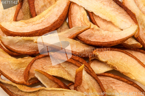 Image of dried apple slices top view up close