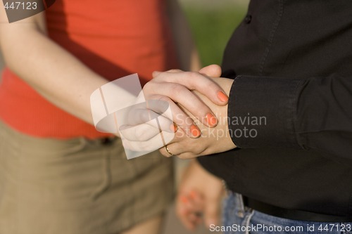 Image of holding hands