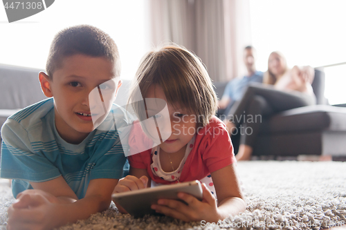 Image of couple spending time with kids