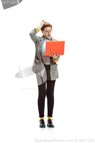 Image of Full length portrait of a happy smiling female student holding notebook isolated on white background