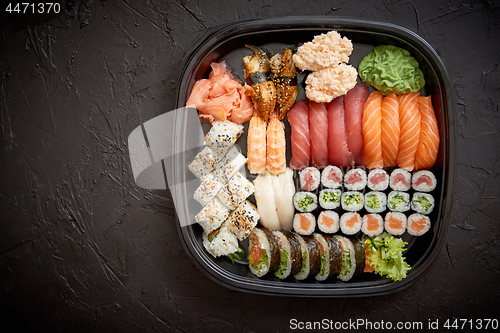 Image of Various kinds of sushi on plate or platter set