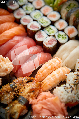 Image of Close up of various types of japanese fresh prepared sushi.