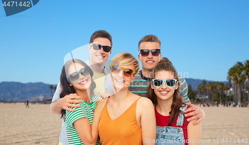 Image of friends in sunglasses over white background