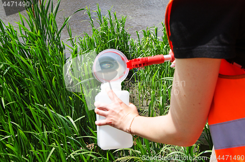 Image of Take samples of water for laboratory testing. The concept - anal